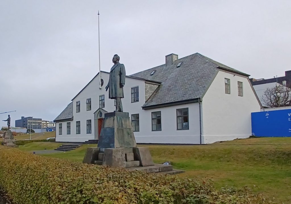 Government House with statue of Hannes Hafstein in foreground