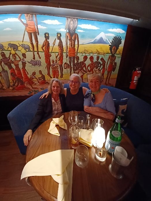 Three friends well fed in a restaurant in NYC