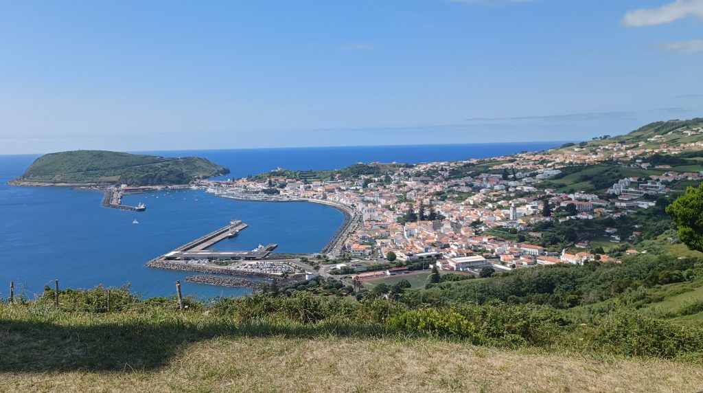 View from Miradouro da Espalamaca across the port of Horta with Monte da Guia on left. Faial, Azores