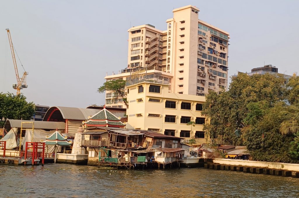 The old and the new, Chao Phraya river side, Bangkok