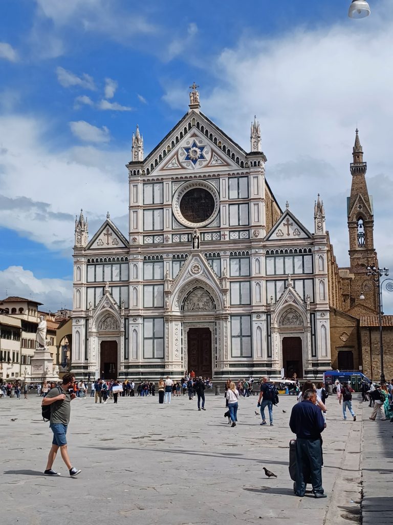 Basilica of Santa Croce. Statue of Dante left