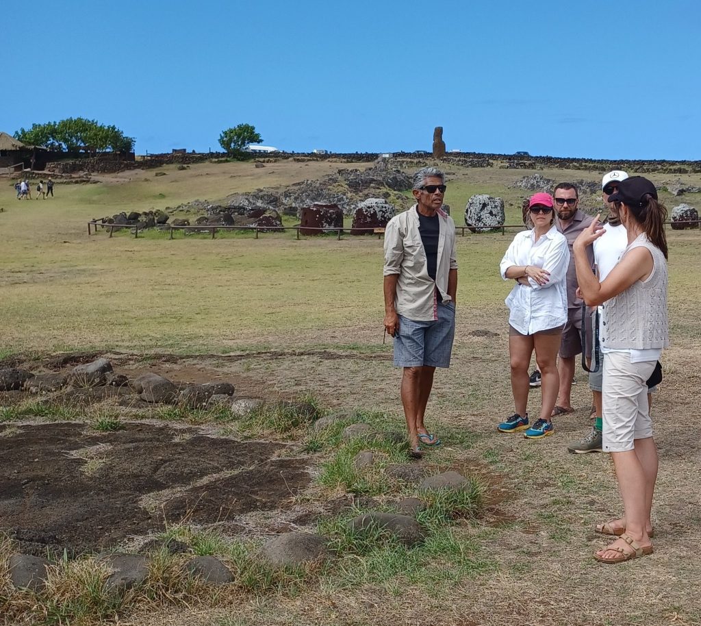 Our guide giving his spiel about the petroglyphs, Ahu Tongariki