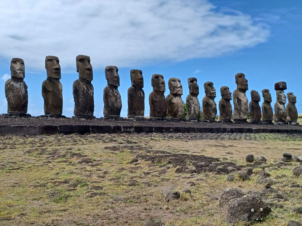 The fifteen moai of Ahu Tongariki: the chief is the tallest. Only one has a pukao (top knot)