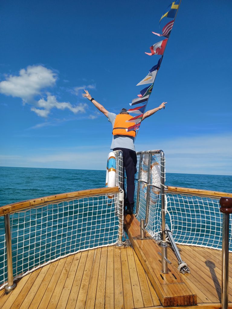Friend poses on bowsprit of Pirate Ship, Black Sea