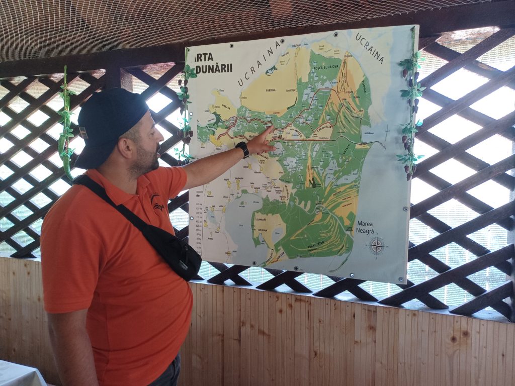 Guide points out our route, Danube Delta