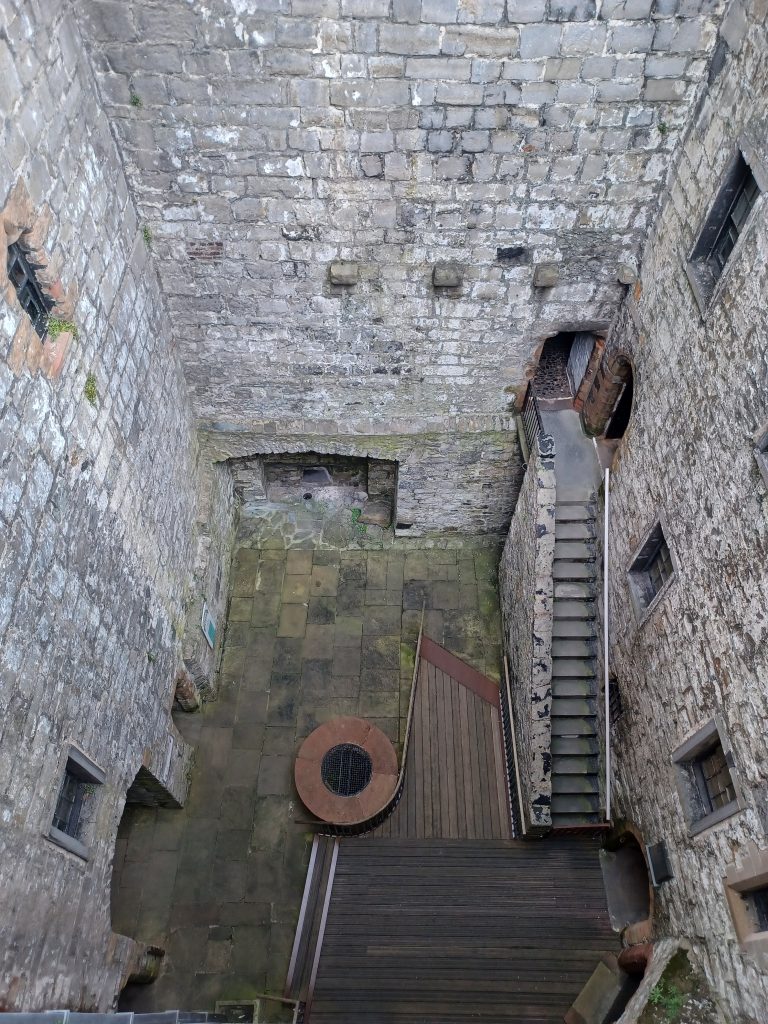 Peering down into the Keep, Castle Rushen